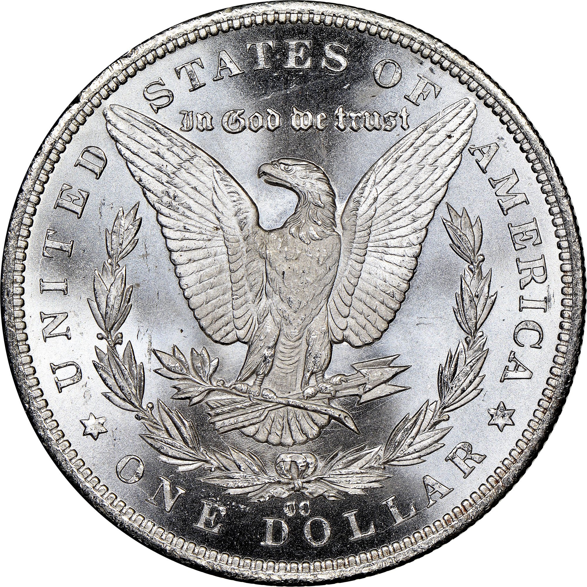 Close-up of 1884-CC Morgan dollar reverse showing the CC Carson City mint mark above the bow of the wreath